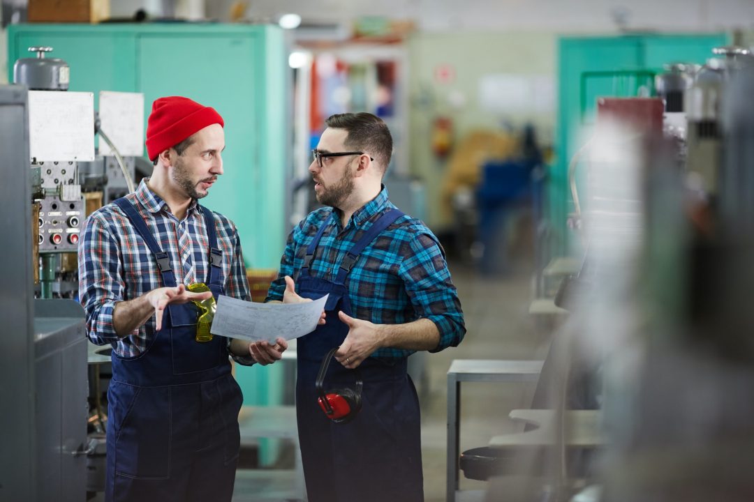 workers in industrial workshop